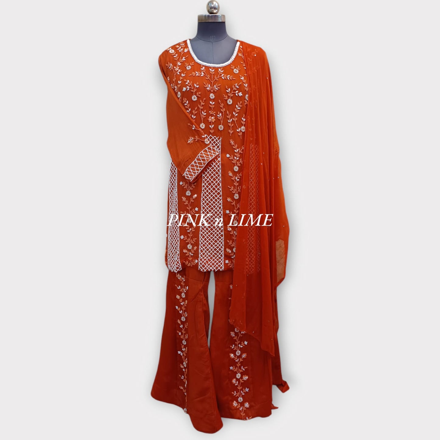 CORAL SUIT WITH BEAUTYFUL HAND WORK BASE ON SHIFFON FABRIC