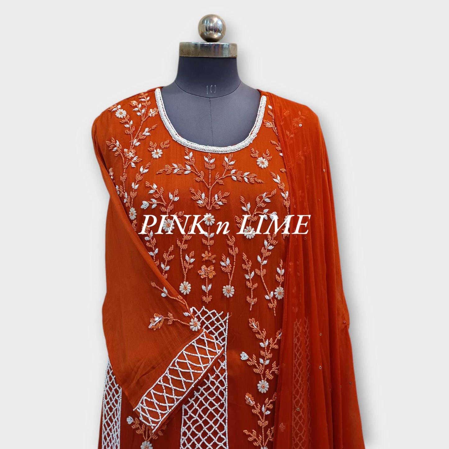 CORAL SUIT WITH BEAUTYFUL HAND WORK BASE ON SHIFFON FABRIC